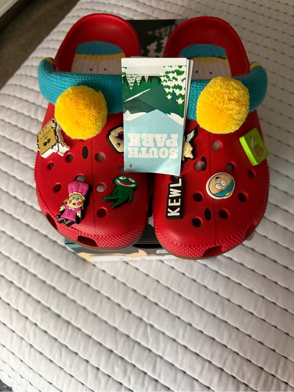 CROCS Kids Red Foam Clogs with Yellow Pom-Pom and Blue Strap Accents